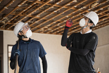 Workers at the factory checking for safe areas, etc.