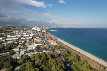 Aerial photography. Top view of the trees of Vaugrenier Park, the city of Villeneuve-Loubet-Plage France and the Mediterranean Sea.