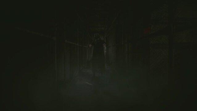 Creepy Figure Haunted Place Witchcraft Foggy Corridor Zoom In. Creepy ghostly sorcerer doing witchcraft in a haunted abandoned place. Zoom in