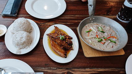 Tuna adobo and tuna bicol express served with steamed rice, authentic traditional Filipino dish 