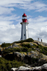 Fototapeta na wymiar Lighthouse in Lighthouse park - West Vancouver - Vertical