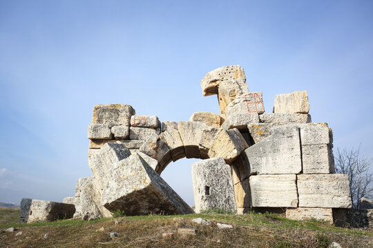 Fallen Wall And Stone Block In Front Of An Arched Doorway; Laodicea, Turkey