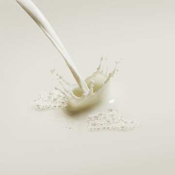 Close Up Of Poured Milk Splashing; Toronto, Ontario, Canada