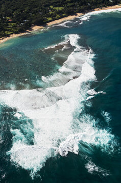 Surf Meets The Beach At Haena; Haena, Hawaii, United States Of America
