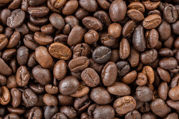 Fresh roasted brown coffee beans background