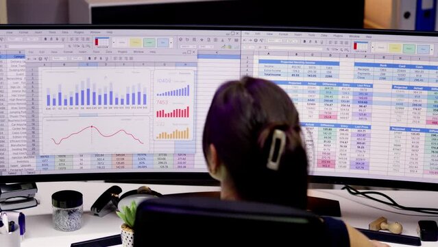 Analyst Working With Spreadsheet Business Data
