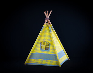 wigwam for children on a black background © serikbaib