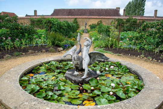 ILMINSTER, SOMERSET, ENGLAND-AUGUST 10 2023: fountain in the gardens at Barrington Court