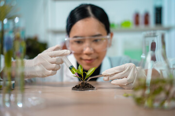 Female scientist researcher conducting an experiment in a labora
