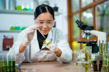 Female scientist researcher conducting an experiment in a labora
