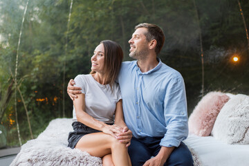 Couple inside tent at glamping