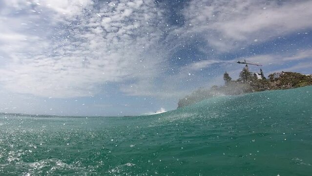 Surfer get barrel on bodyboard with blowout at Froggies Beach in Coolangatta on the Gold Coast Australia