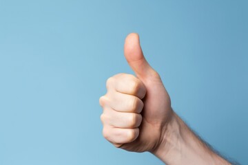 Thumbs up isolated on blue background, concept Admiration, Excellent