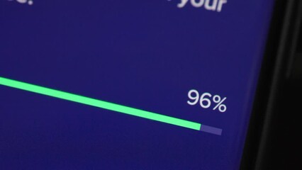 Antivirus software scanning progress bar with percentage numbers done on a laptop screen