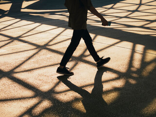 People walking on Pathway Silhouette Shadow Urban city lifestyle