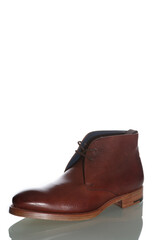One Tanned Derby Boot of Calf Leather with Leather Sole Placed On Pure White Background