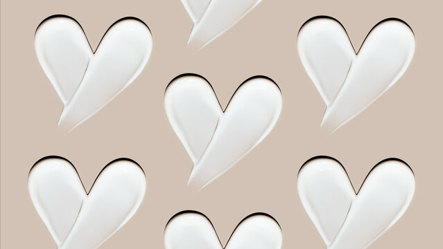pattern cosmetic smears of creamy texture on a beige background