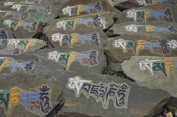 Mani stones with Buddhist mantra "Om Mani Padme Hum" in Zanskar Valley, Ladakh, INDIA
