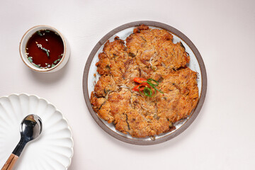 Nokdujeon or Nokdu Bindaetteok is a Savory Korean Pancake Made With Ground Mung Beans.
