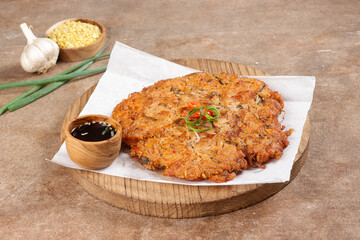 Nokdujeon or Nokdu Bindaetteok is a Savory Korean Pancake Made With Ground Mung Beans.
