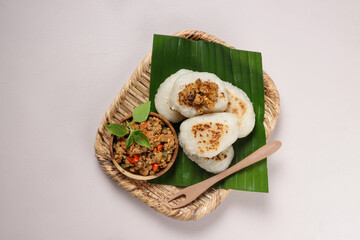 Ulen Ketan Bakar Sambal Oncom is Indonesian Traditional Snack Made From Grilled Steamed Glutinous Rice Served With Oncom Sauce. 