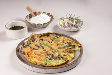Haemul Pajeon is Korean Seafood Scallion Pancake.