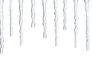 Fototapeta premium Icicles border on white background with empty copy space Generative AI