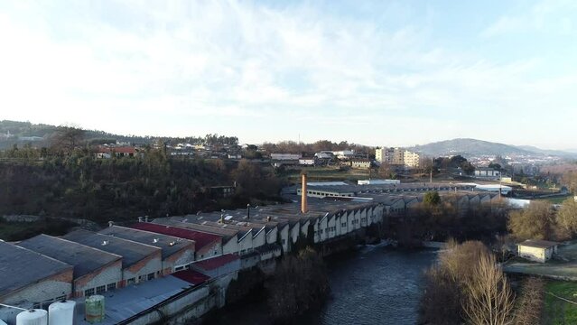 Aerial View of factory next to the river