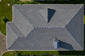 Shingles texture - close up view of asphalt roofing shingles - obrazy, fototapety, plakaty