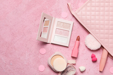 Pink tools and accessories for women's makeup.
