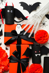 Gift boxes and halloween mockups on white background, top view