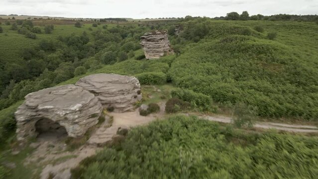 4k Aerial footage of Bridstones sandstone rock formations in Dalby Forest, North Yorkshire