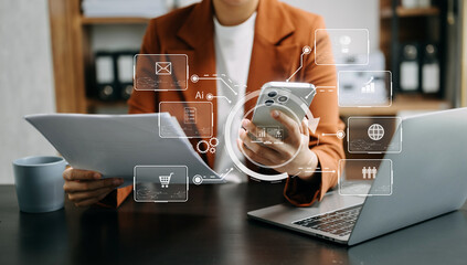 Digital marketing media in virtual screen.business woman hand working with mobile phone and modern...