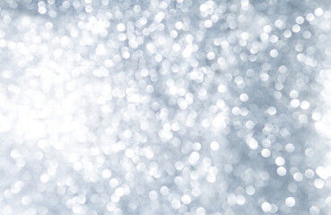 Abstract blurred silver glitter bokeh background, festive and holiday concept background