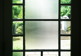 Patterned glass in the window in the room