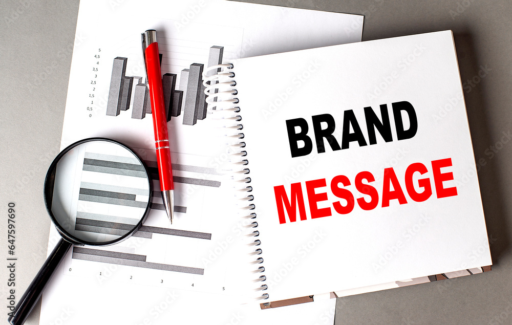 Poster brand message text written on notebook with chart
