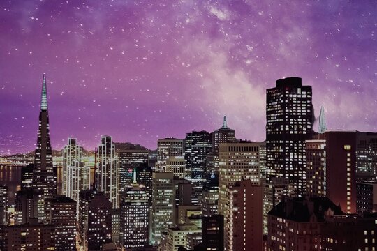 Fototapeta Illuminated cityscape at night under milky way, San Francisco, California, USA