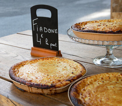 Traditional Fiadone Cheesecakes for sale in a market, Corsica, France