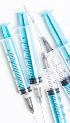 Disposable plastic syringe prepared for injection and vaccination in the hospital. The concept of medicine and health