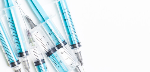 Disposable plastic syringe prepared for injection and vaccination in the hospital. The concept of...