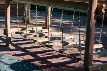 Close-Up of a wooden chain bridge in summer