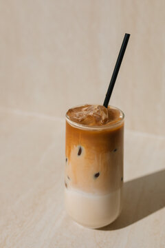 Close-up of a glass of iced coffee on a table