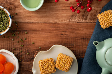 Delicious mung bean moon cake for Mid-Autumn Festival food mooncake on wooden table background.