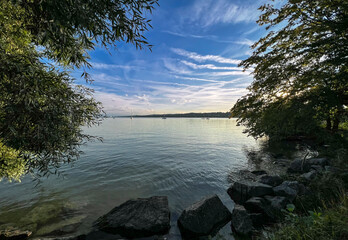 The view before sunset on the shore of the lake.