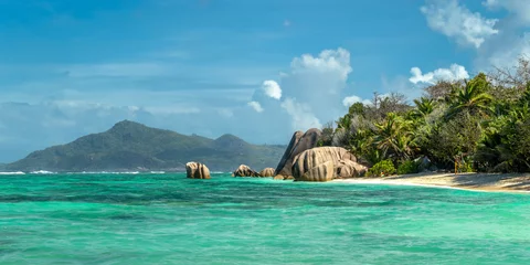 Foto auf Acrylglas Anse Source D'Agent, Insel La Digue, Seychellen Granite rocks and palm trees on the scenic tropical sandy Anse Source d'Argent beach, La Digue island, Seychelles