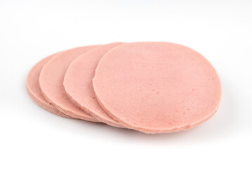 Sliced boiled tasty sausage isolated on white