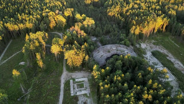Aerial drone video fly over old lost place nazi bunker Weingut 1 in sunset