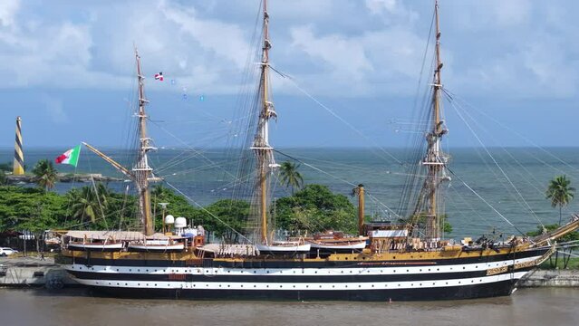 Aerial orbiting shot of Italian training ship Amerigo Vespucci at port of Santo Domingo during world tour, Dominican Republic 