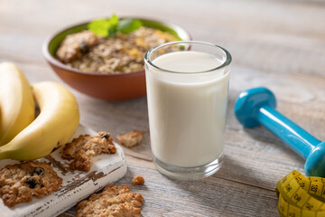 Healthy breakfast with milk, muesli, and bananas. Healthy food concept. - 647613897