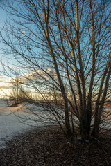 Beautiful sunset over the career with sand in winter. 